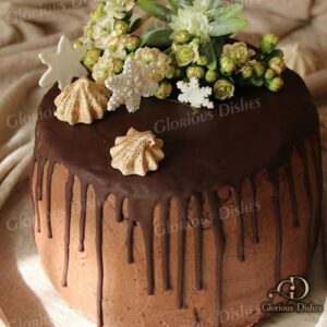 Chocolate entremet cake decorated with oysters